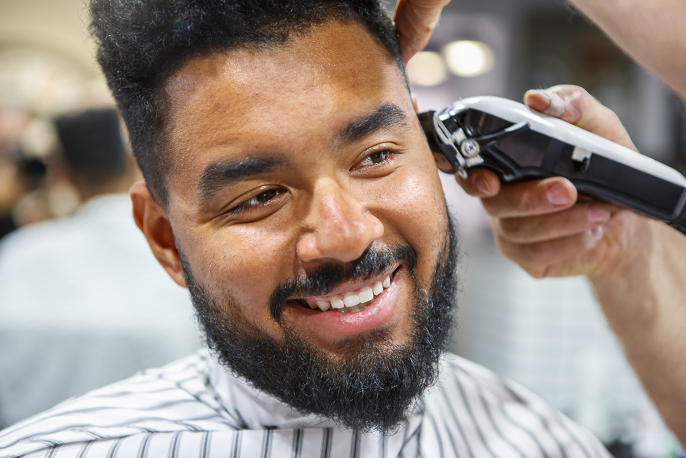 Man with beard having the sides of hair shaved