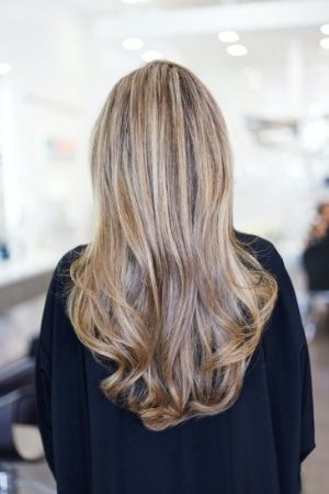 a woman's styled hair at a salon